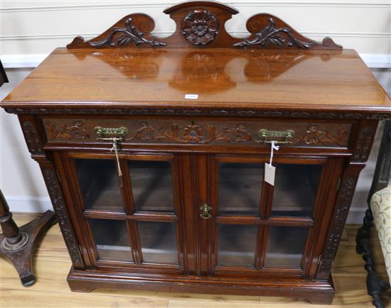 A Victorian carved walnut chiffonier W.108cm